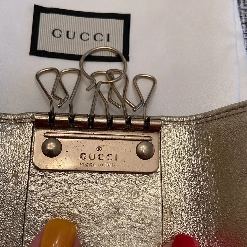 Gucci Gokd Keyhokder Impeccable condition with dust bag